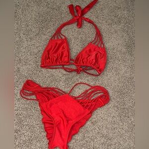 Luli Fama red strappy bikini